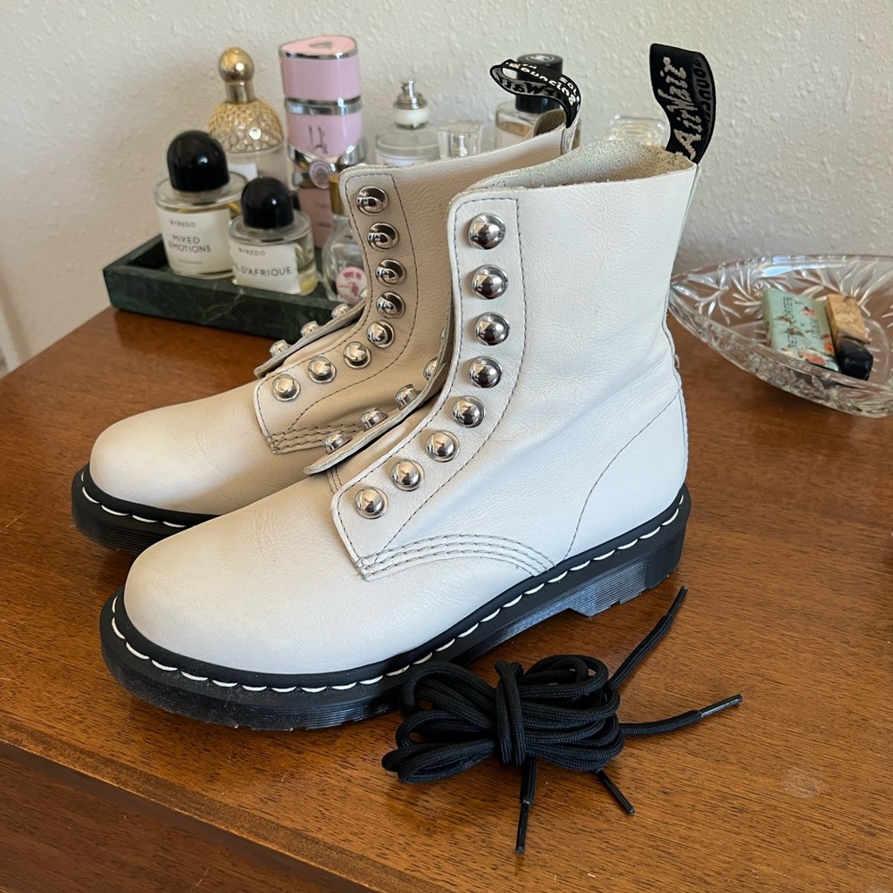 Dr. Martens chalk white boots.